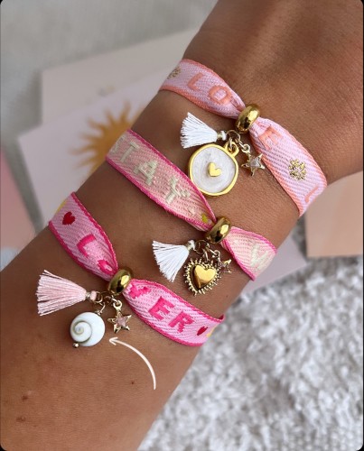 Bracelet et son pendentif oeil de Ste lucie à paillettes !