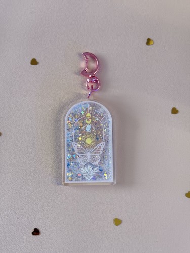 - PRÉCOMMANDE - Porte clé pendentif à paillettes magique